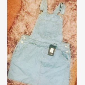 Jean mini overall dress .